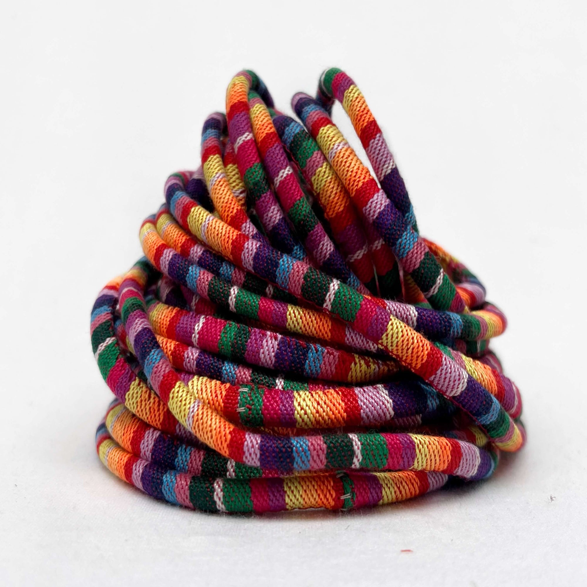 festival coloured woven cord on white background for display