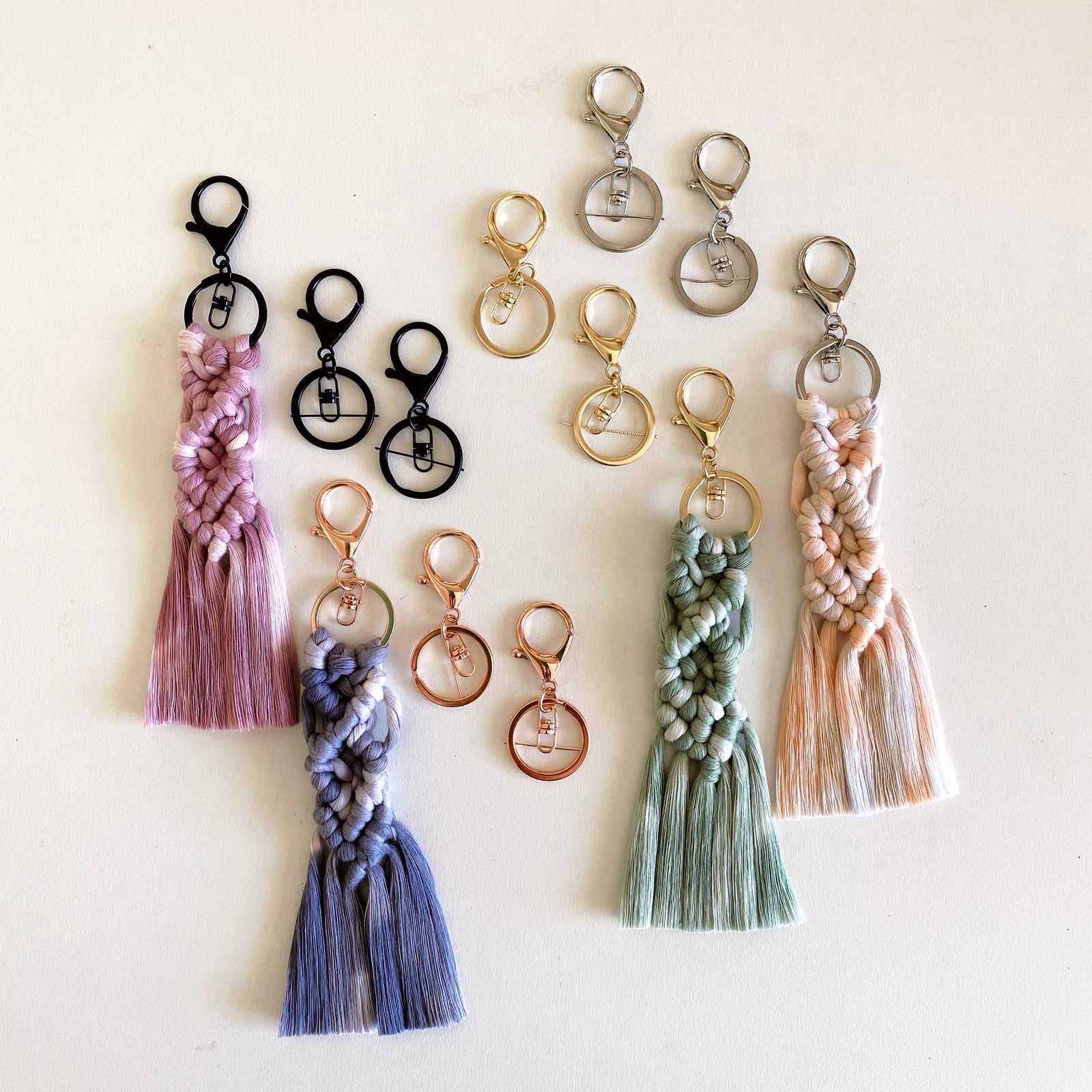 assorted metal keyring colours with macrame pattern attached