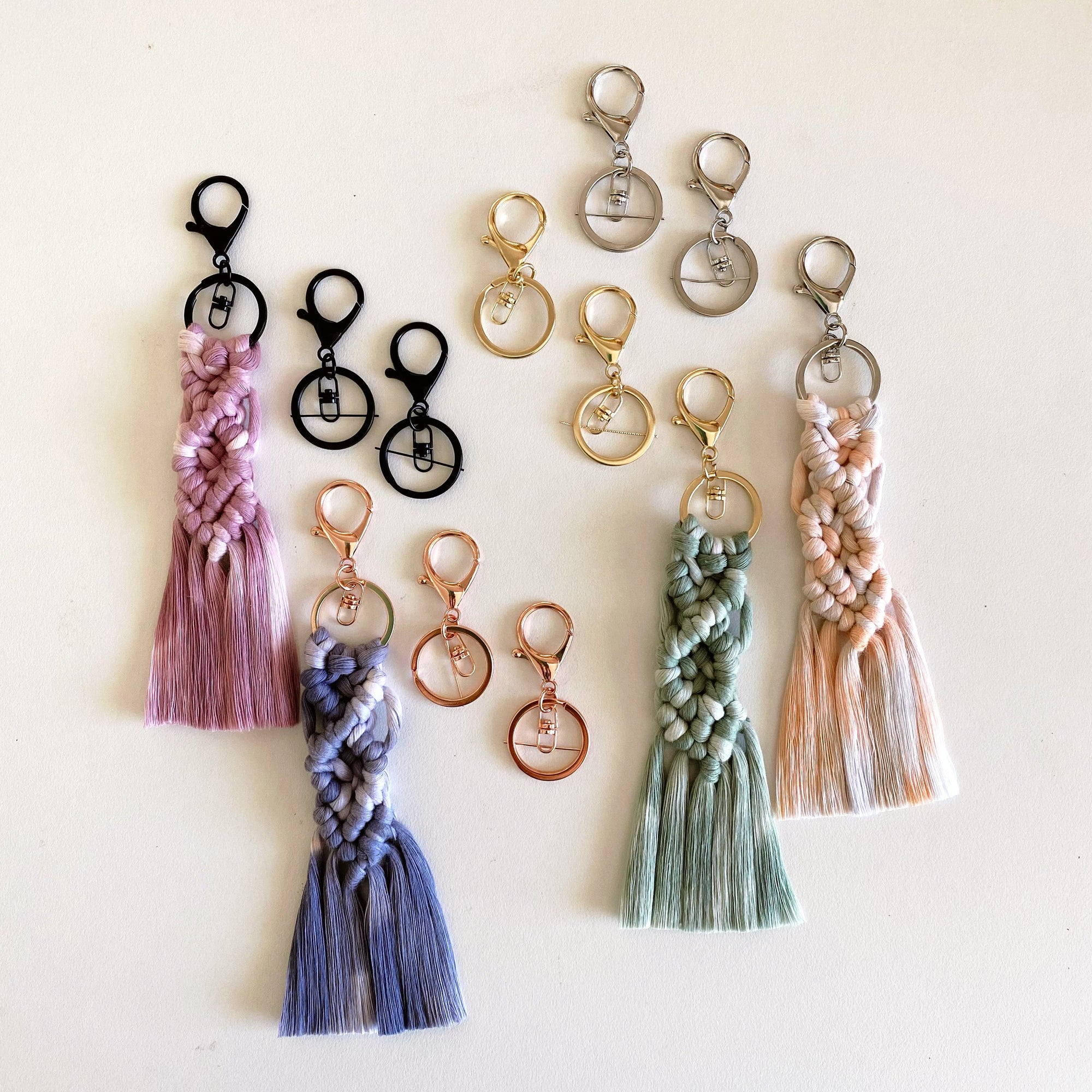 assorted metal keyring colours with macrame pattern attached